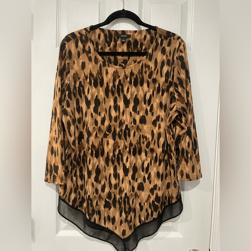 Alfani Animal print. Beautiful black sheer peeps out there bottom. polyester Top
